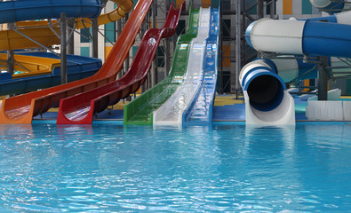 Water park. Blue pool slide swimming. Aquapark.