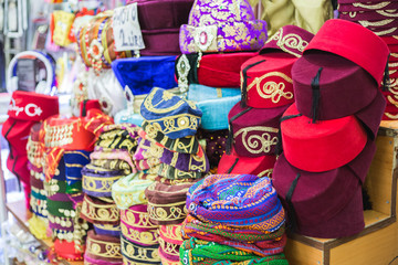 Fototapeta na wymiar Colorful hats (fez) at the Grand Bazar in Istanbul, Turkey