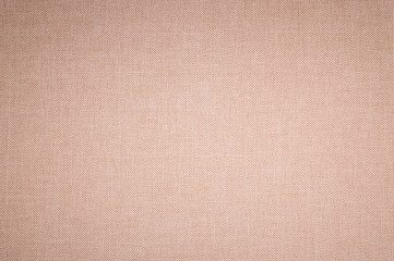 Textured background surface of textile upholstery furniture close-up. beige Color fabric structure