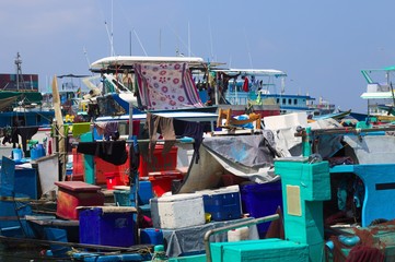 Fototapeta na wymiar A lot of colored boats in the harbor of Male fish market (Maldives, Asia)