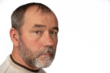 Obraz premium portrait of a gray-bearded man on a white background