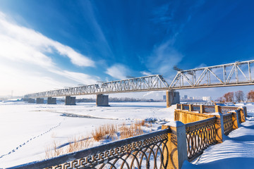 Fototapeta na wymiar Railway bridge over the Ob river. Novosibirsk, Russia