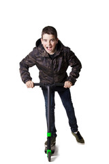 young teenager with isolated scooter in white background