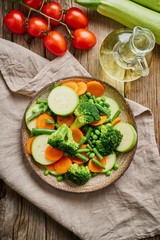 Mix of boiled vegetables, steam vegetables for dietary low-calorie diet. Broccoli, carrots, cauliflower, top view