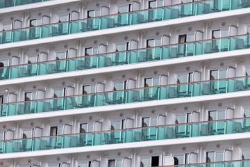 Pattern of blue balconies on a white cruise