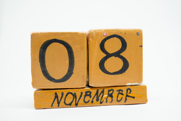 november 8th. Day 8 of month, handmade wood calendar isolated on white background. autumn month, day of the year concept