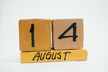 august 14th. Day 14 of month, handmade wood calendar isolated on white background. summer month, day of the year concept