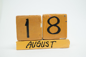 august 18th. Day 18 of month, handmade wood calendar isolated on white background. summer month, day of the year concept