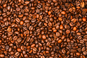 Coffee beans background. Top view. Coffee beans texture.