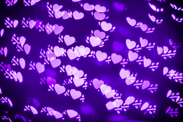 Obraz na płótnie Canvas Heart Bokeh Shape in Purple