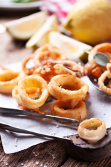 Crispy calamari rings on a rustic table