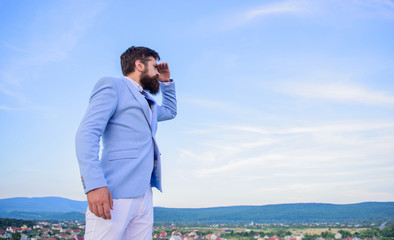 Looking for opportunities and new chances. Developing business direction. Businessman bearded face sky background. Man formal suit manager looking direction. Changing course. New business direction