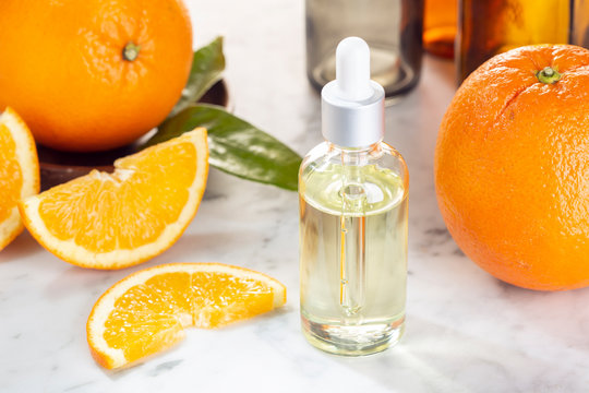 Orange essential oil. Orange oil for skin care, spa, wellness, massage, aromatherapy and natural medicine
