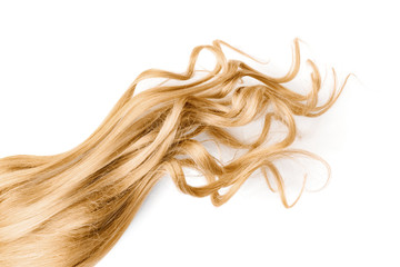 Natural wavy blond hair on white background