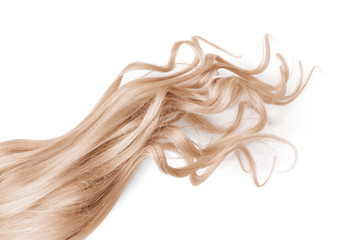Natural wavy blond hair on white background