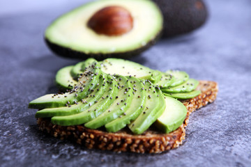 Sandwich with avocado - healthy breakfast concept