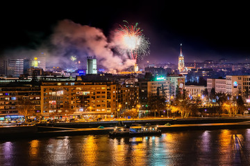 Fototapeta na wymiar Novi Sad, Serbia - January 01, 2019: Fireworks in Novi Sad, Serbia. New Year`s fireworks.