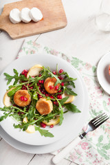 Goat cheese, garden rocket and pomegranate salad.