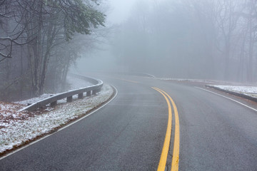 Fototapeta premium Winter morning on a foggy road