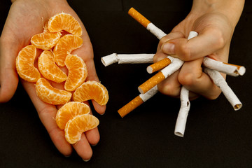 Cigarettes on a black background.  World No Tobacco Day. Stop smoking. stop cigarettes and nicotine