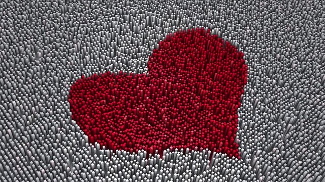Artistic red heart shape built from cube blocks in motion.