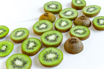 Background for the profile, design, printing with fruit. Fresh kiwi sliced. The basis for the banner with kiwi. Fresh and natkralnye vitamins. Healthy food