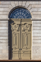 Detailed view at the exterior wood door at the University of Porto rectory building