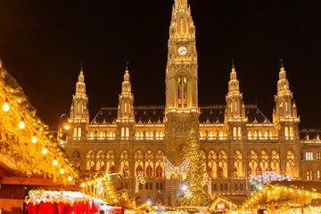 Fototapeta na wymiar The Christmas market in front of the Rathaus City hall of Vienna, Austria