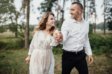 Fototapeta premium Portrait of a happy young couple in love.