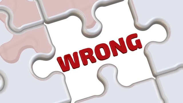 It is right. Folded white puzzles elements and one red with word RIGHT falls into its place with the red word WRONG. Footage video