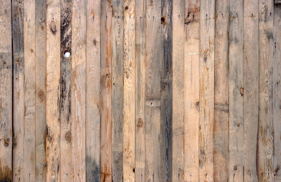 Multicolored wooden surface with old faded paint texture