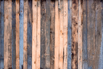 Multicolored wooden surface with old faded paint texture