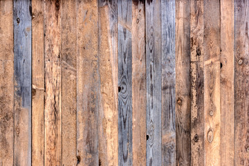 Multicolored wooden surface with old faded paint texture