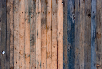 Multicolored wooden surface with old faded paint texture