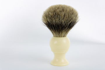 Classic hand-made pure badger shaving brush on white background