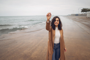 young girl walking on the beach