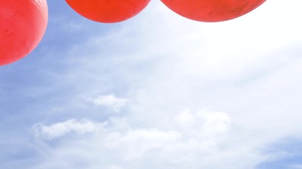 Orange commercial fishing buoys viewed from below, on a fishing boat in Cadgwith Cove.