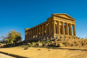 Fototapeta na wymiar Greek Temple in Valley of the ancient Temples in Agrigento, Sicily