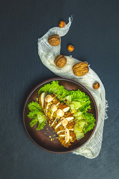 Salad, chicken with pineapple, lettuce, cream sauce and walnut