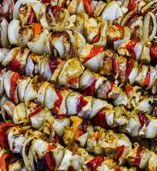 Grilled pork and vegetables on a bamboo stick