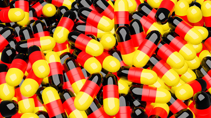 a medicinal capsule in the colors of the German flag 3d Illustration