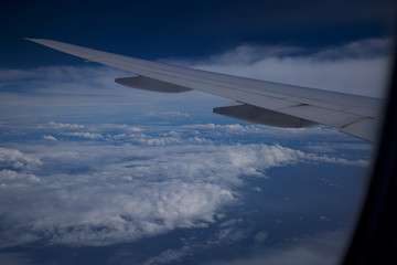 Fototapeta premium Plane flying over ocean