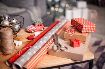 Wrapping Holidays Gifts. Christmas and New Year Decorations