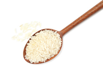 Fototapeta na wymiar Spoon with uncooked rice on white background, top view