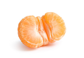 Half of peeled ripe tangerine on white background