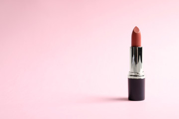 Bright lipstick on color background. Space for text
