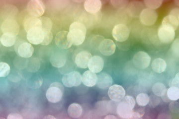 Fototapeta premium Golden Colorful blurred bokeh lights background. Abstract sparkles particle moving small large defocus different crystal plan shadow overlay blend screen modes, copy space for text logo