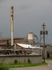 Obraz premium factory with industrial chimney