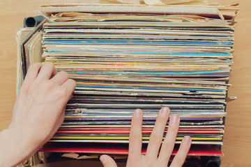 person pick vinyl record crate digging collection b