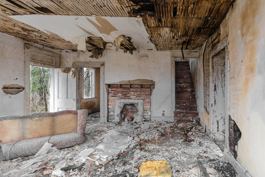 Interior of abandoned house falling apart